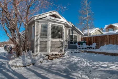 Private Hot Tub and Steps to Main Street - Charming Cottage Retreat