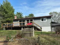 Castle Rock Lakefront Home, with pier, sand bottom, and wrap around deck