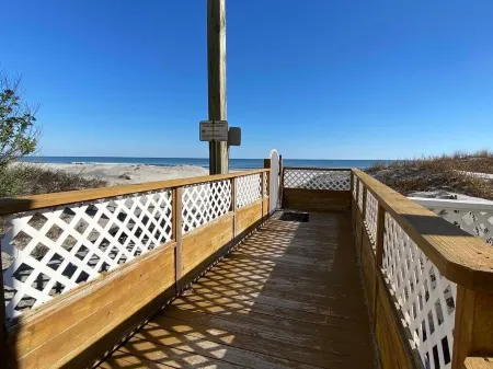 Resort View Balcony and Outdoor Pool - Beautiful Coastal Haven