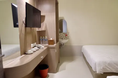 Style50 Homestay Отели рядом с достопримечательностью «Зоопарк Сурабая»