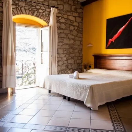 Corte Fiorita Albergo Diffuso Отели в г. Боса