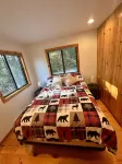 Riverside Cabin Near Torch Lake – Kayaks Included!