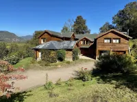 Beautiful log house on a hillside. Spectacular view. Sleeps 12