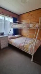 The Bach in old Wharewaka well located for a fabulous lake holiday.