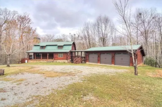 Unwind with the whole family at this serene 5-bedroom cabin retreat