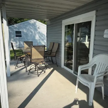 Big Pine Lakefront Retreat with Private Beach, Dock, Fire Pit & Sunset Views