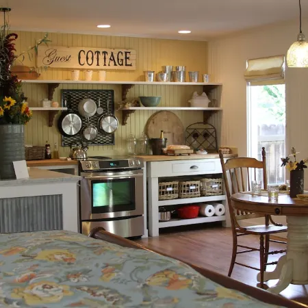 Charming studio cottage on quiet street with beautiful landscaping and gardens.