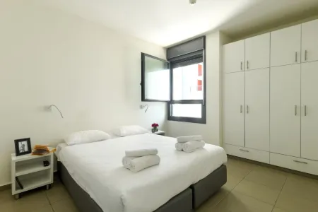 Tel Aviv Uni Smart & Cozy Stay D701 Отели рядом с достопримечательностью «Зоопарк Петах-Тиква»
