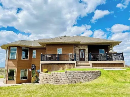 Large Bayside Golf Course home with Lake Views.