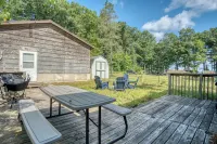 Charming Green Cabin with Private Round Lake Access, Minutes from Ludington