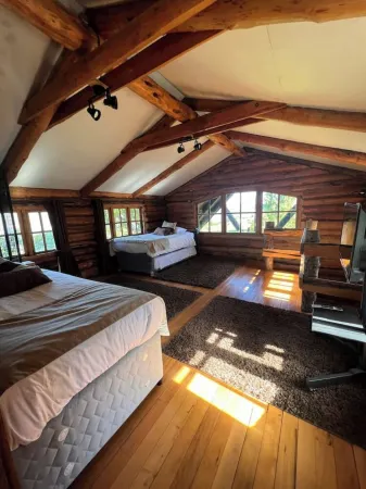 Cabaña Acogedora con Tinaja y Encanto Familiar Отели в г. Чилоэ