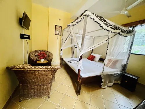 Two minutes walk  to the Beach! a comfortable 4Bedroom Villa in Diani Galu Beach