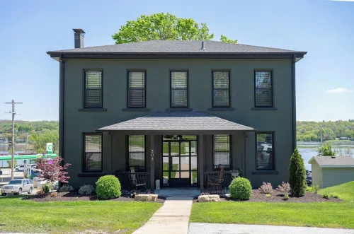 Stay Where History Has a Heartbeat - Mike Wolfe's Two Lanes Guesthouse Hotels in Le Claire