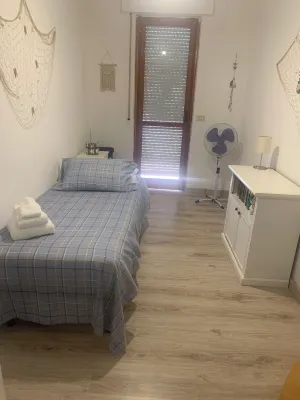 Charming 2-bedroom condo with AC, WiFi just Steps from the Beach