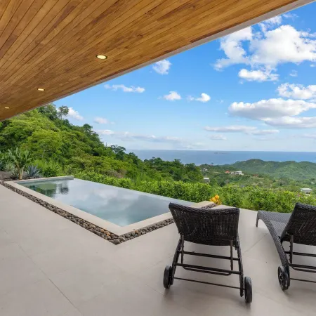 Mountainside Home with Modern Design Sweeping Ocean Views & Private Swimming Pool