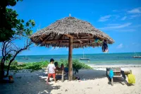 Blue Earth Beach Bungalow - Strand