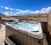 Luxury 4 bedroom twin home, beautiful views. Private hot tub. Covered patio.