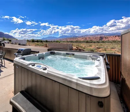 Luxury 4 bedroom twin home, beautiful views. Private hot tub. Covered patio.