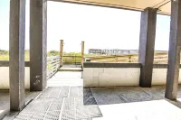 Ocean front 2 bedroom / 2 bathroom condo.  Sleeps 6.  Elevator/pool/grill.