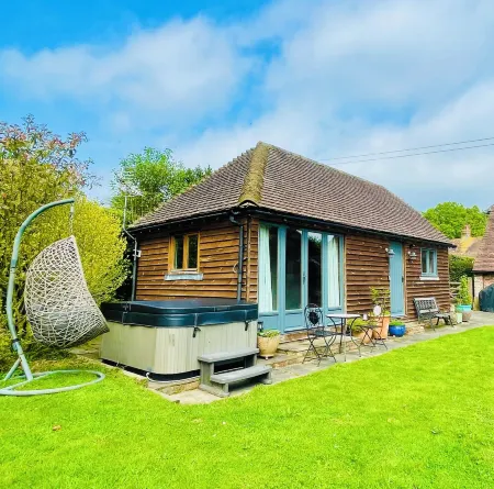 The perfect getaway. Set in stunning gardens overlooking a beautiful lake