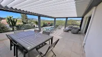 Superb apartment in semi-detached villa with large bioclimatic terrace