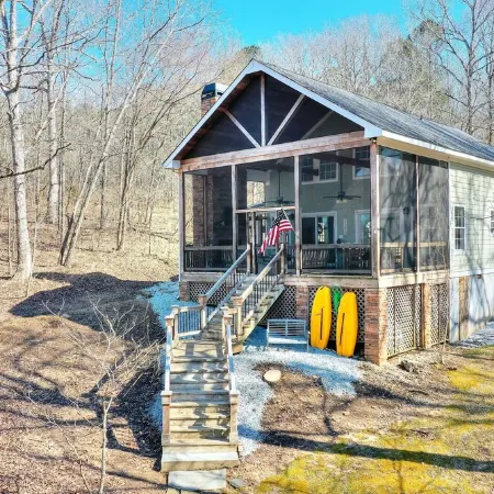 Breathtaking porch just steps from the water.