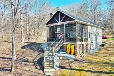 Breathtaking porch just steps from the water.