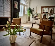 Spacious studio apartment with 20th Century Modern design in an industrial space
