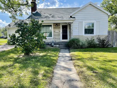 Green Roof Inn | Centrally Located 2BR/1BA Home