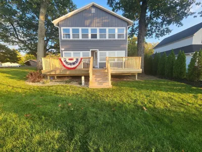 Enjoy a freshly remodeled cottage with a large beach and plenty of parking.