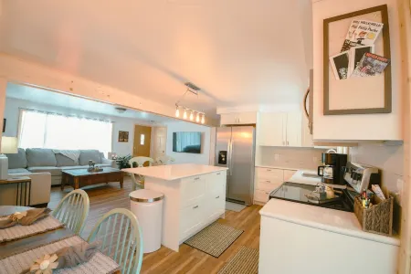 Ride your ATVs and snowmobiles directly from the house!