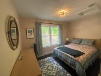 Beautiful new modern cabin with 100 feet of shoreline on Long Lake