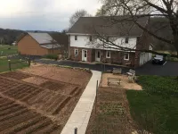 Amazing country farm setting!!!  Animals, flower/vegetable gardens.