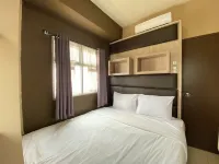 Well Furnished 2Br at Suites @Metro Apartment - parkir