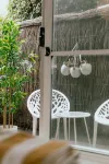 Bright beachfront studio with terrace & aircon
