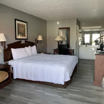 Covered Bridge Inn & Suites Отели в г. Онеонта