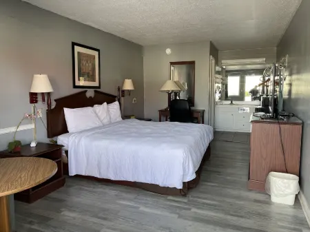 Covered Bridge Inn & Suites Отели в г. Онеонта