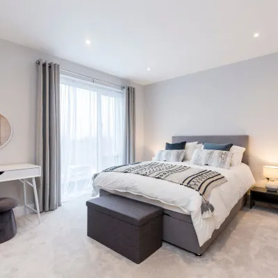 Stylish new home with parking - king beds garden