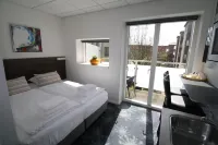 Hotel Faber | Aarhus | Værelser, mødelokaler, hotellejligheder Hotels near Vaagnende Kvinde