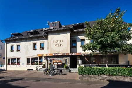 Hotel Weinhaus Weis Отели в г. Дхронеккен