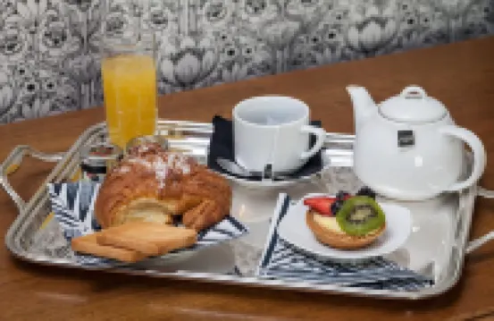 貝卡利亞波波洛廣場套房酒店