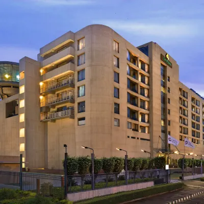 Savoy Suites Manesar Hotels near Baba Jhopdi Wala Temple Dhanawas