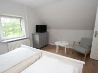 Charmantes Ferienhaus Mit Kamin in Lintig Hotels in Geestland