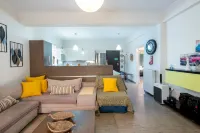 Charming 2BR retreat near market & beach Hotels near Eugenides Foundation New Digital Planetarium