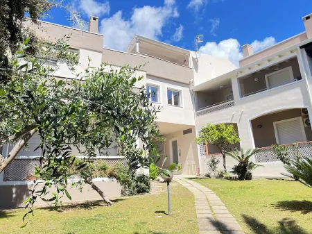 Villasimius: La Chiocciola apartment Surrounded by greenery.