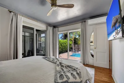 NEW: Poolside Palms Paradise Retreat!