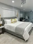 Modern 4 bedroom home with pool.  Sleeps 10-12 comfortable.