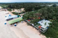 Nasya's Beach Side Cottages - Beach