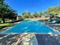 Detached Villa with Games Room, Pool, and Panoramic Views in San Damiano - Pools