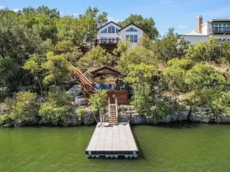 A rare find - bright gorgeous 3 bedroom home nestled on Lake Marble Falls!